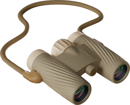 Bushnell A1 binoculars 10x25 with detachable strap in Trench Tan color on a transparent background