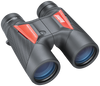 Front right view of black binoculars with "Bushnell" printed in white on an orange panel on the right and "Spectator Sport" printed in white on an orange panel on the left
