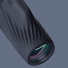 Black Bushnell A3 monocular on a gray background