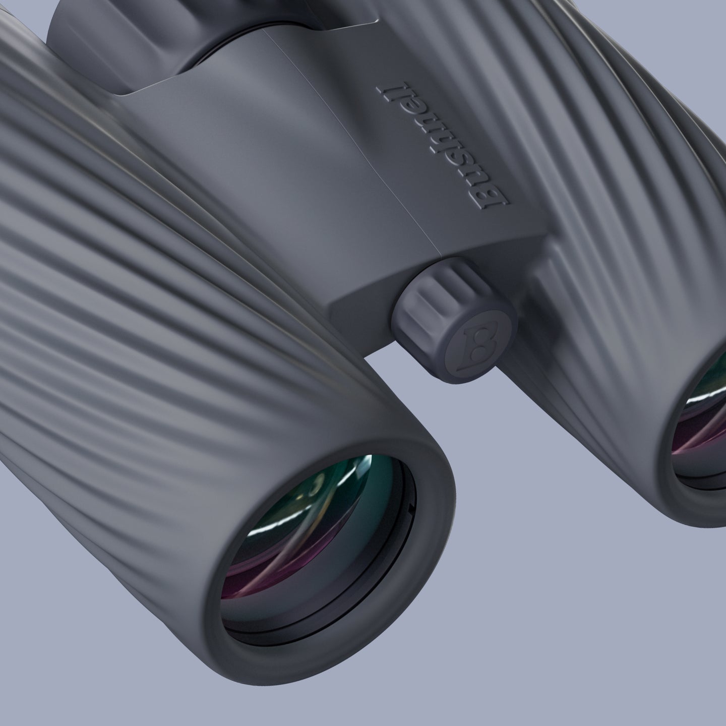 Close-up of a pair of Bushnell A3 binoculars with a brand logo on a light gray background