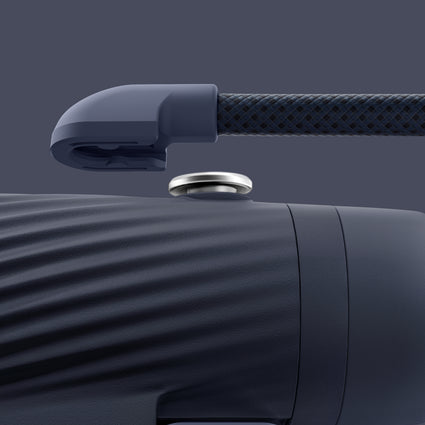 Close-up of a dark blue detachable strap on a matching background