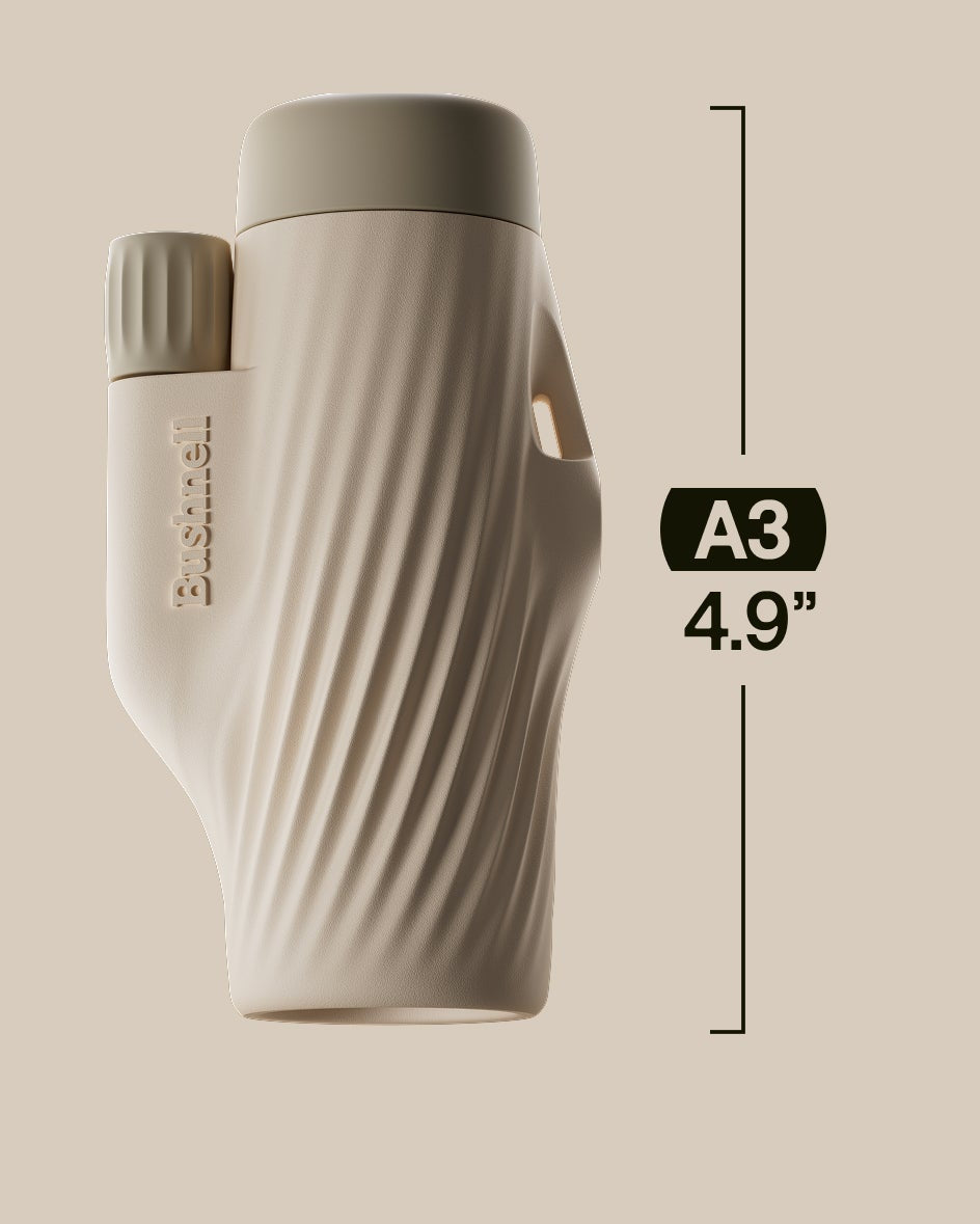 Beige binoculars with dimensions labeled on a beige background