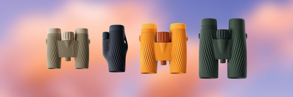 Four pairs of binoculars in different colors on a gradient background